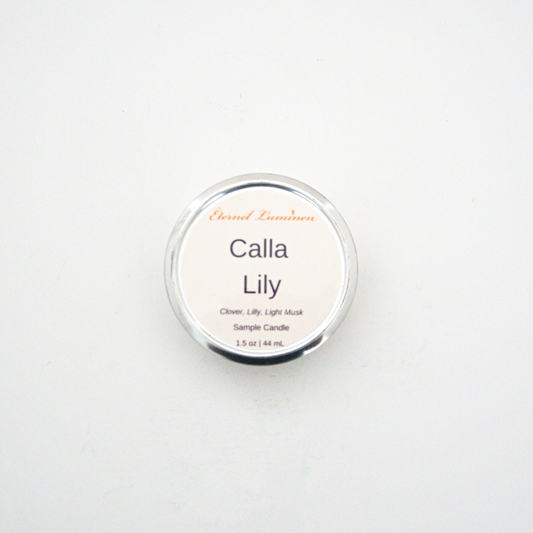 A 1.5oz Calla Lily sample candle in a tin jar sitting against a white background made by Eternel Luminen