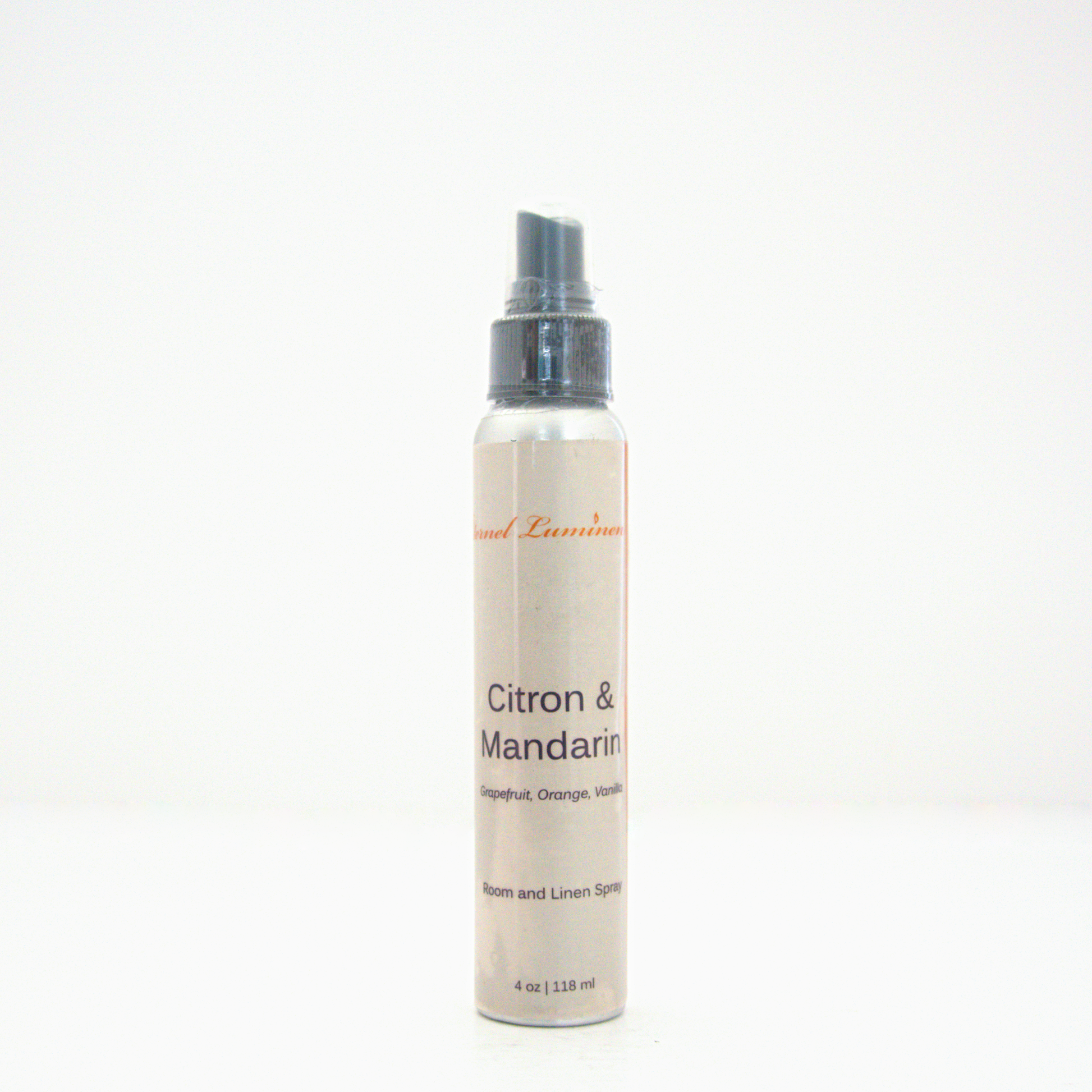A 4oz Citron & Mandarin room & linen spray sitting against a white background made by Eternel Luminen.
