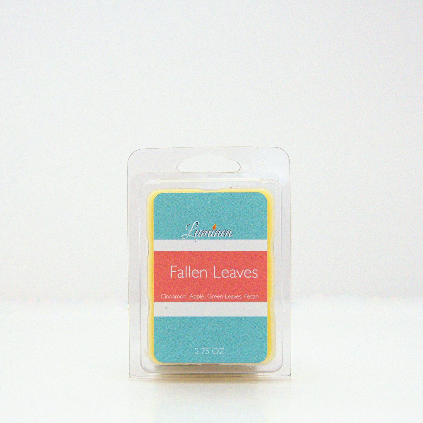 A 2.75 oz, 6 cube, Fallen leaves wax melt sitting against a white background made by Eternel Luminen.