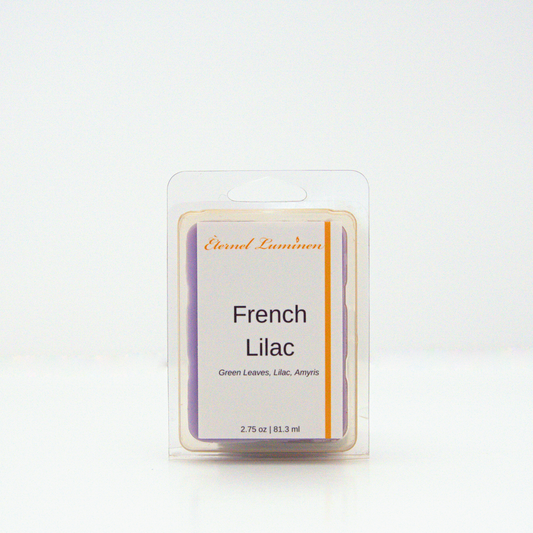 A 2.75 oz, 6 cube, french lilac wax melt sitting against a white background made by Eternel Luminen.