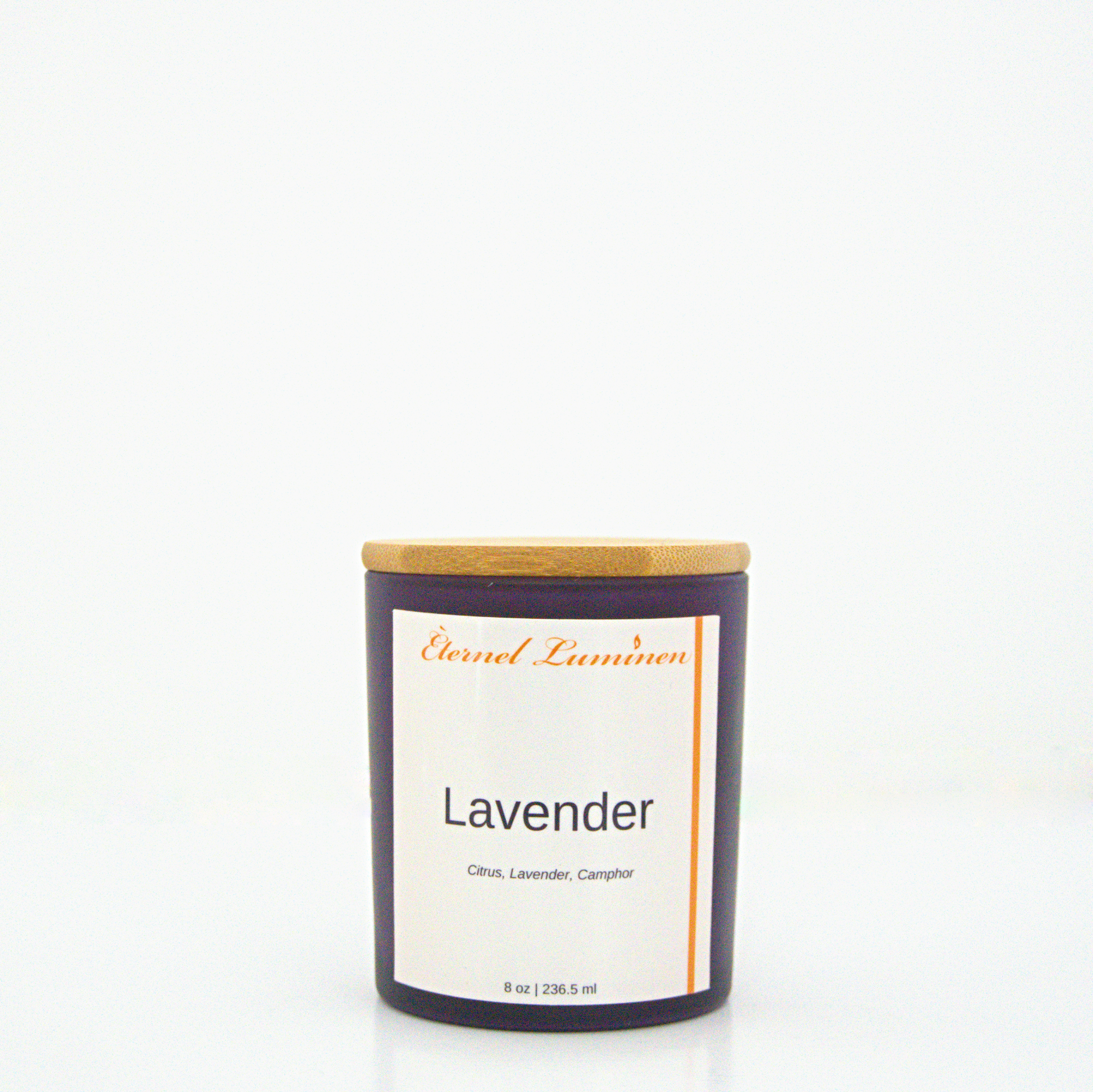 A 8 oz Lavender frosted candle with a wooden lid sitting against a white background made by Eternel Luminen.