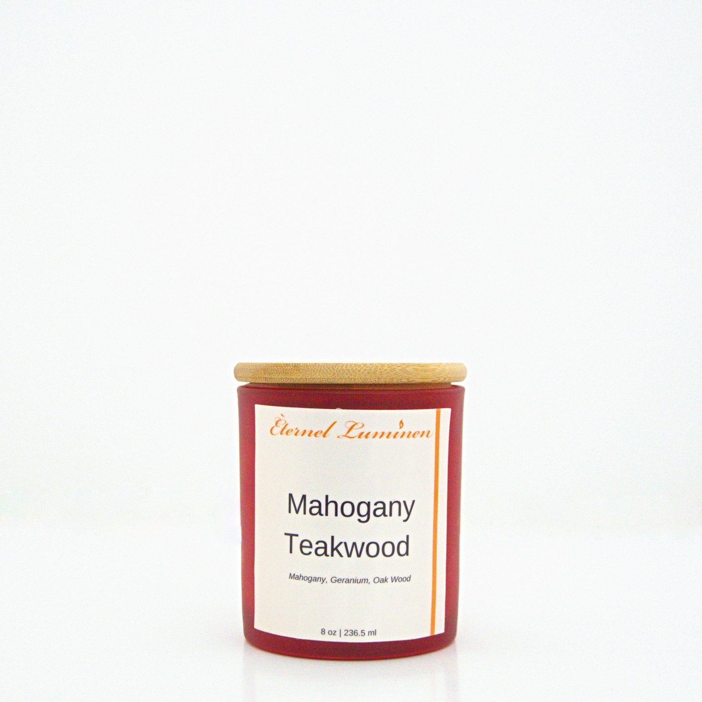 A 8 oz Mahogany Teakwood frosted candle with a wooden lid sitting against a white background made by Eternel Luminen.