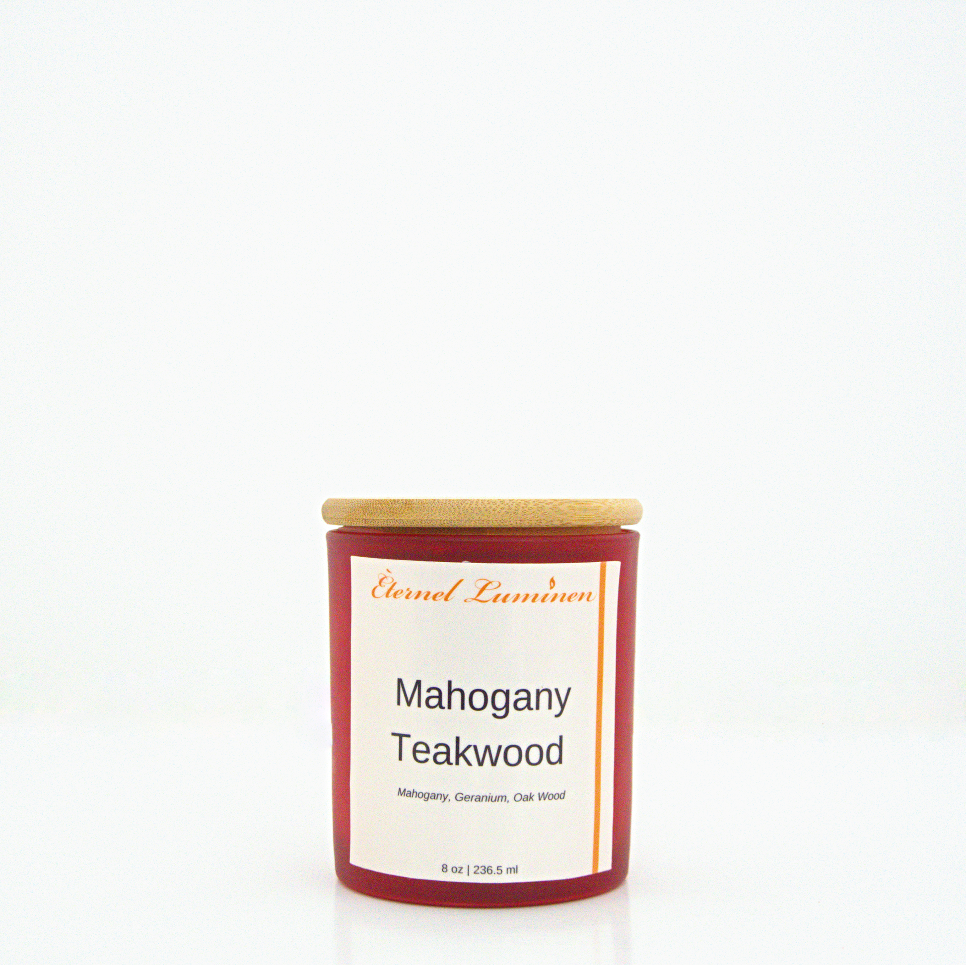 A 8 oz Mahogany Teakwood frosted candle with a wooden lid sitting against a white background made by Eternel Luminen.