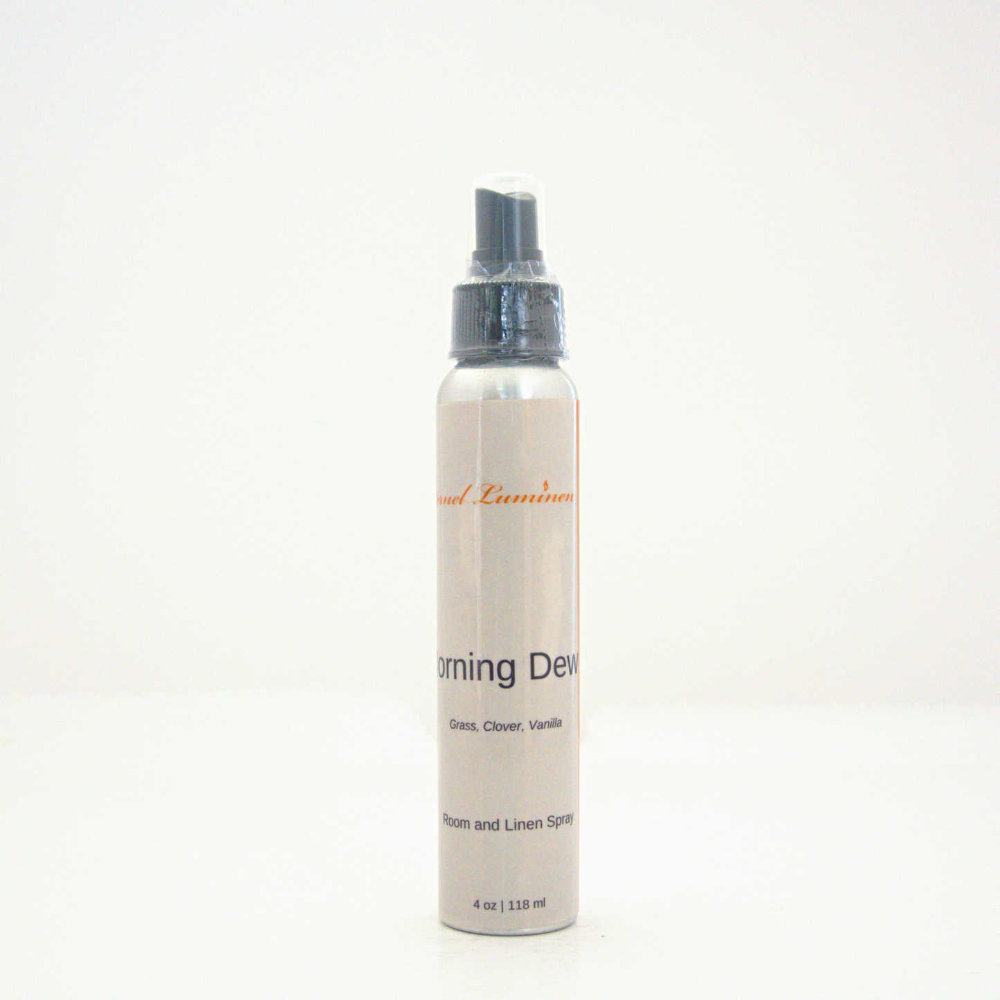 A 4oz Morning Dew room & linen spray sitting against a white background made by Eternel Luminen.