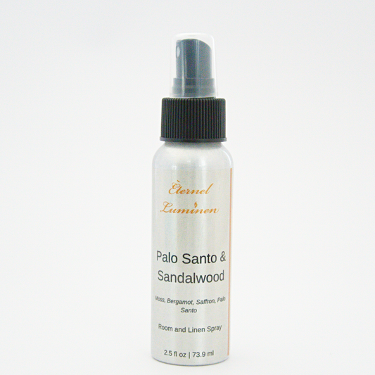 A 2.5oz Palo Santo & Sandalwood room & linen spray sitting against a white background made by Eternel Luminen.