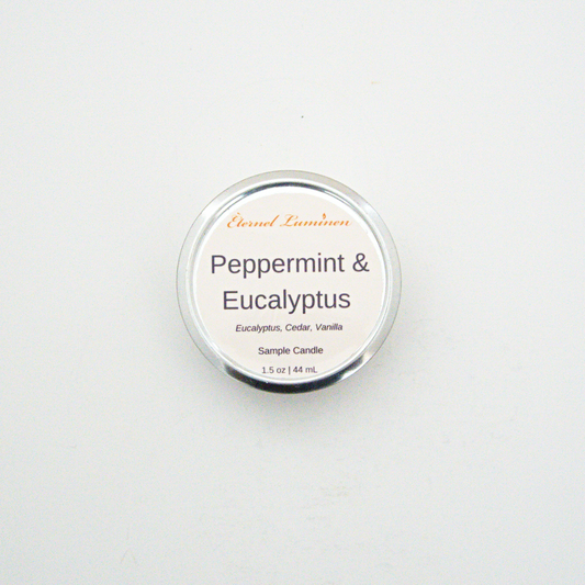A 1.5oz Peppermint & Eucalyptus sample candle in a tin jar sitting against a white background made by Eternel Luminen