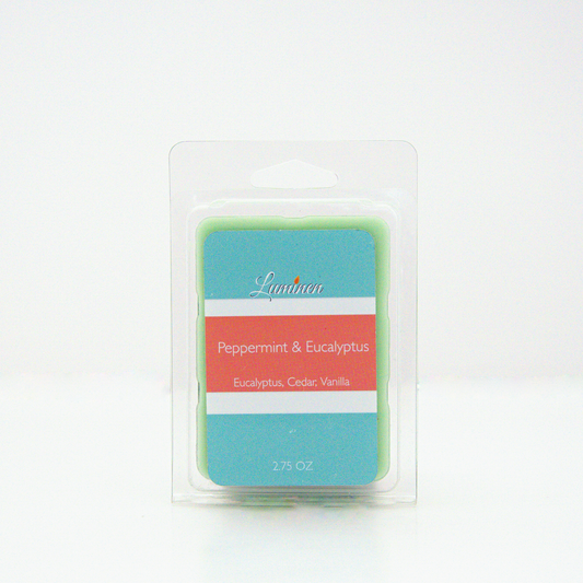 A 2.75 oz, 6 cube, peppermint & eucalyptus wax melt sitting against a white background made by Eternel Luminen.