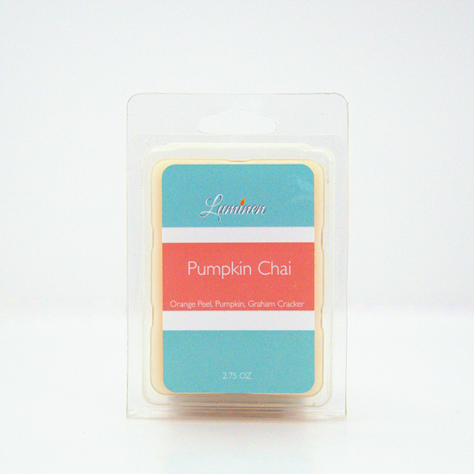 A 2.75 oz, 6 cube, Pumpkin chai wax melt sitting against a white background made by Eternel Luminen.