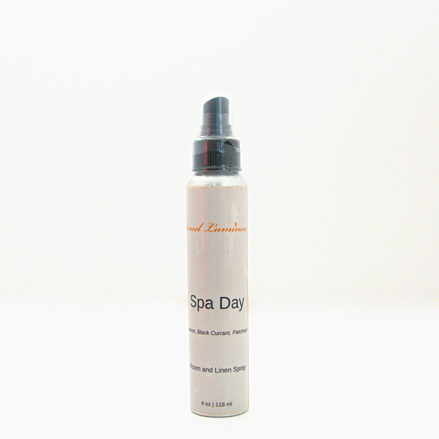 A 4oz Spa Day room & linen spray sitting against a white background made by Eternel Luminen.