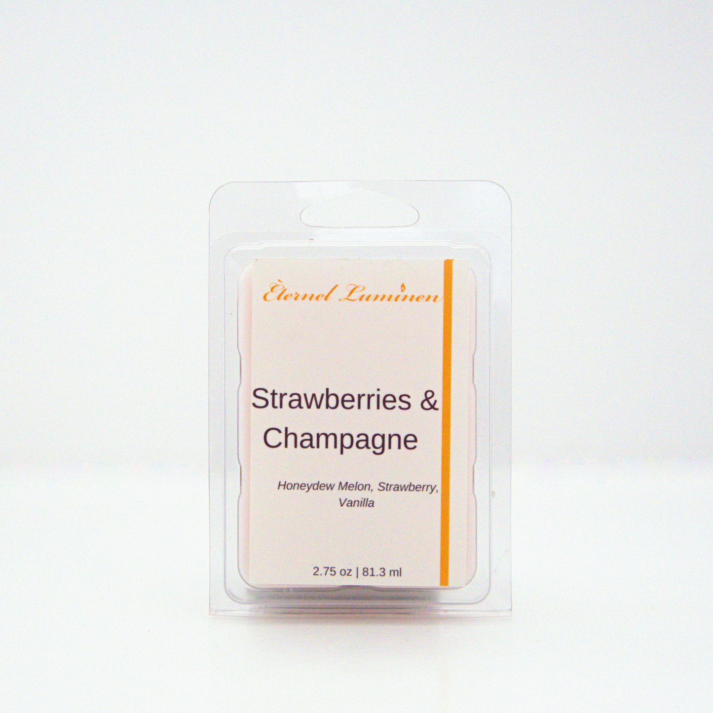 A 2.75 oz, 6 cube, strawberries & champagne wax melt sitting against a white background made by Eternel Luminen