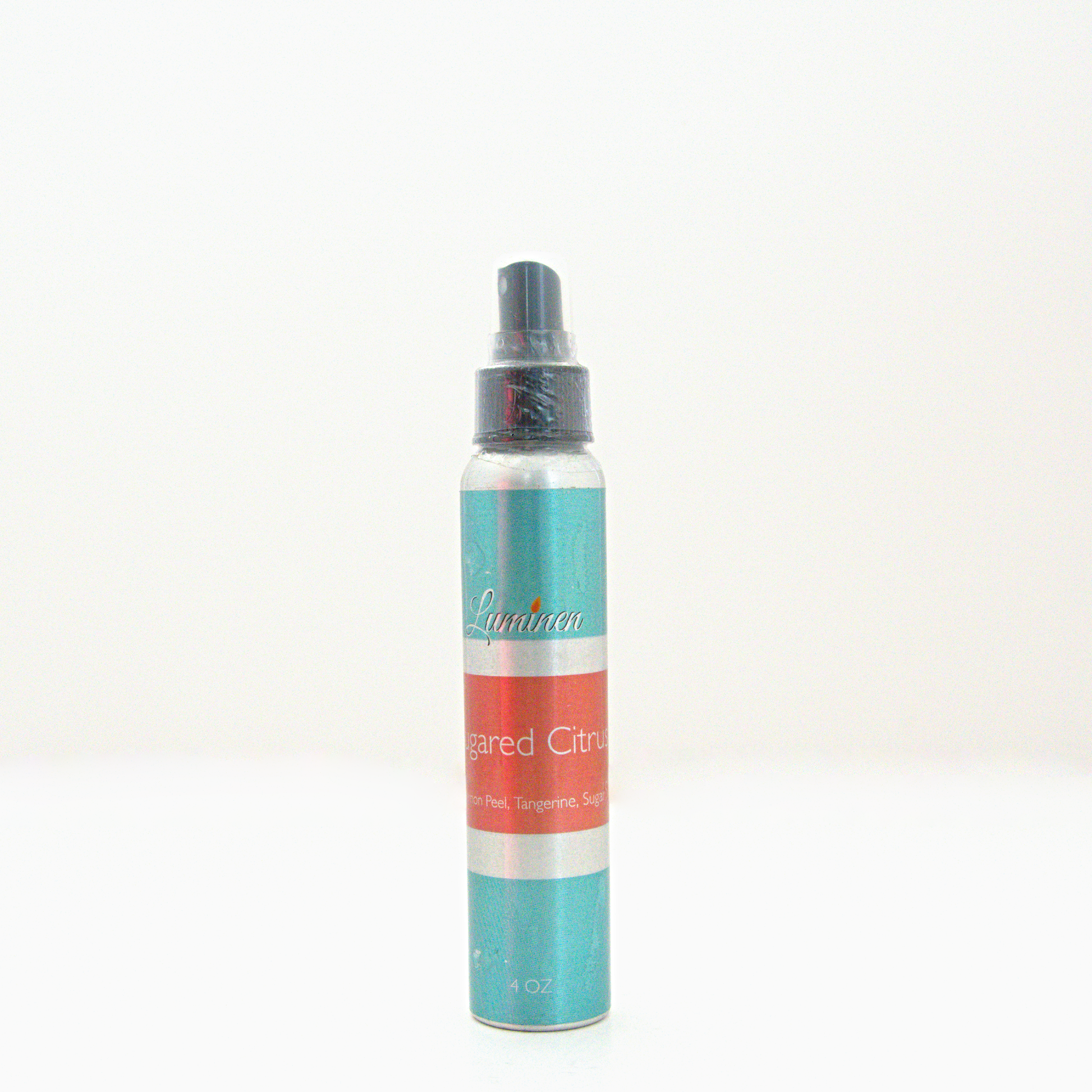 A 4oz Sugared Citrus room & linen spray sitting against a white background made by Eternel Luminen.