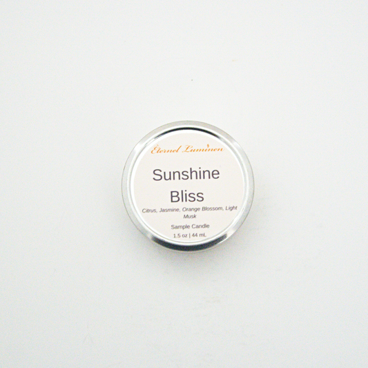 A 1.5oz Sunshine Bliss sample candle in a tin jar sitting against a white background made by Eternel Luminen