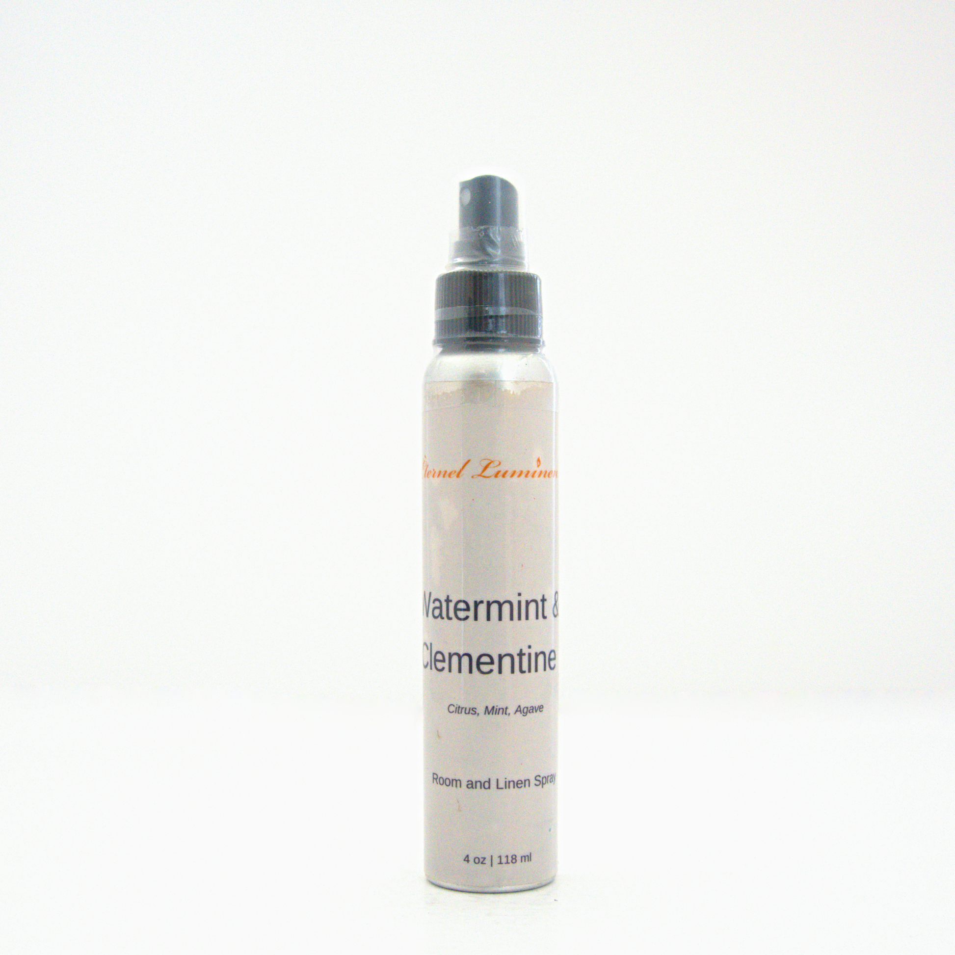 A 4oz Watermint & Clementine room & linen spray sitting against a white background made by Eternel Luminen.