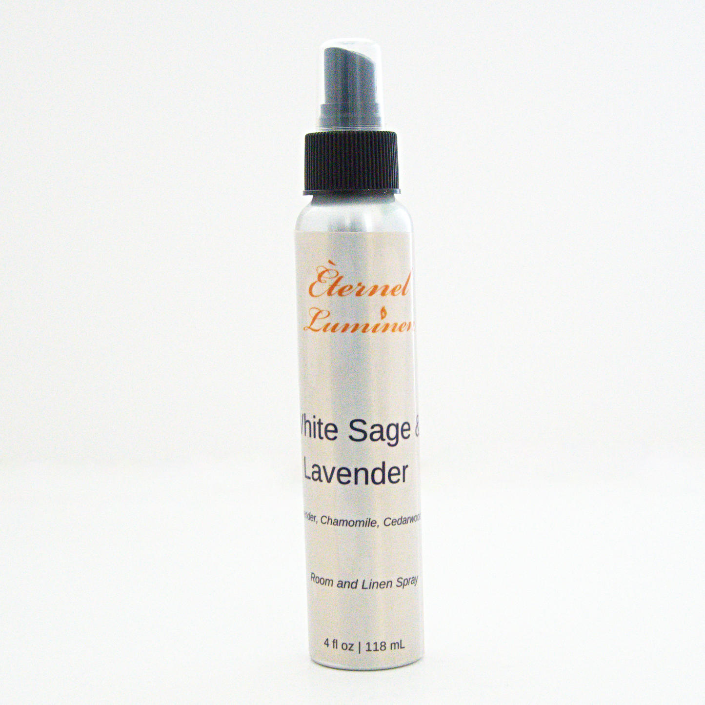 A 4oz White Sage & Lavender room & linen spray sitting against a white background made by Eternel Luminen.