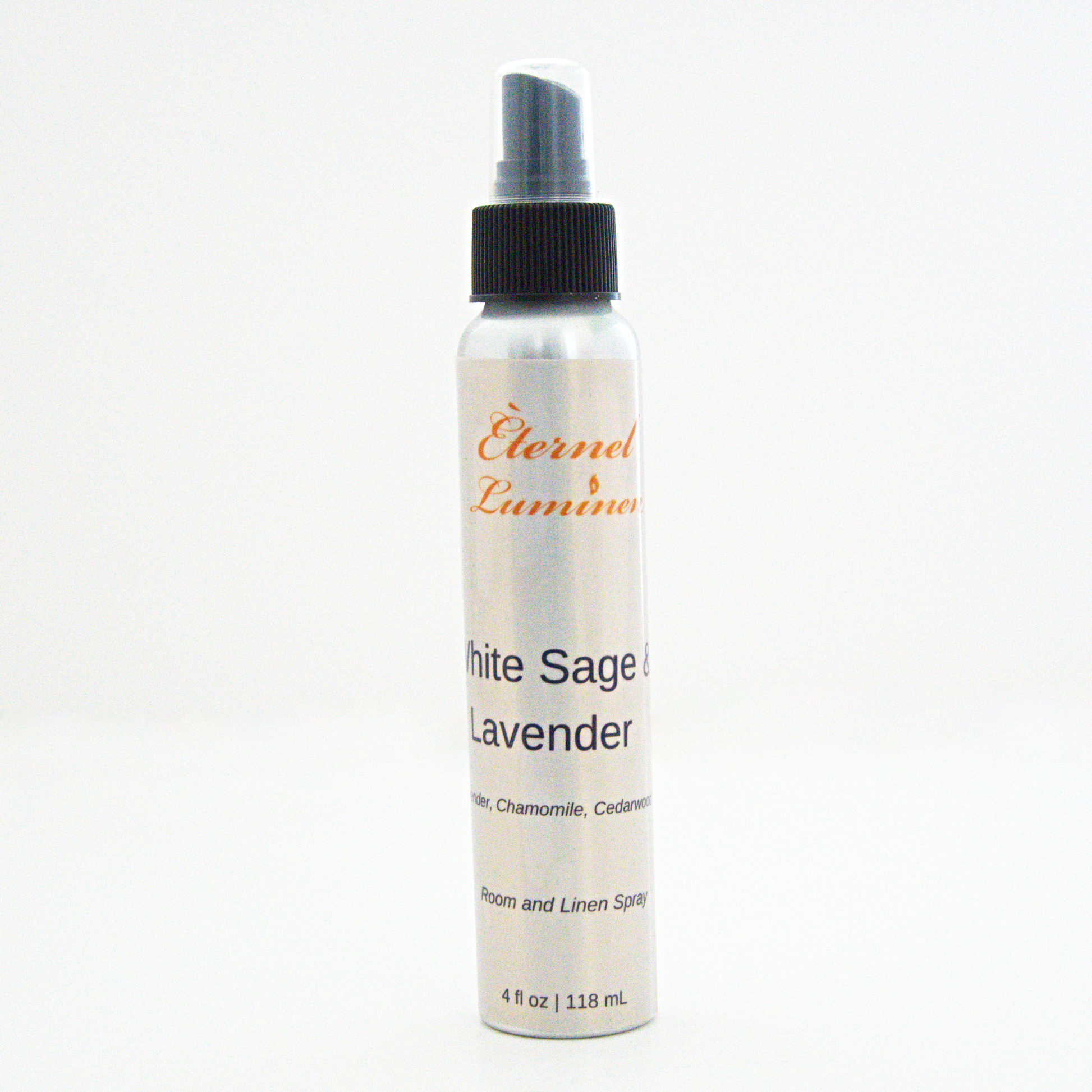 A 4oz White Sage & Lavender room & linen spray sitting against a white background made by Eternel Luminen.