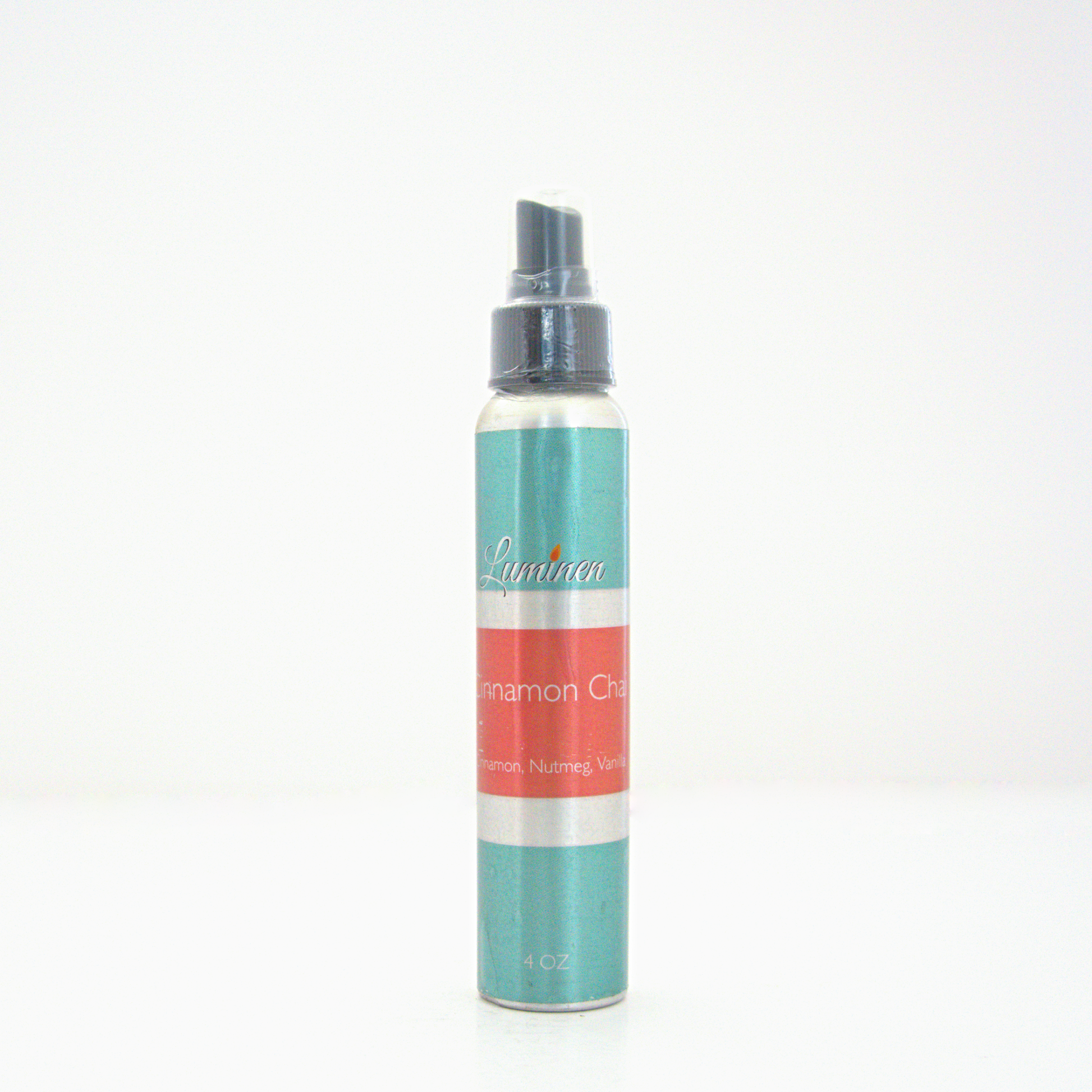 A 4oz Cinnamon Chai room & linen spray sitting against a white background made by Eternel Luminen.