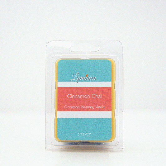 A 2.75 oz, 6 cube, Cinnamon Chai wax melt sitting against a white background made by Eternel Luminen.