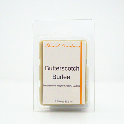 A 2.75 oz, 6 cube, Butterscotch brulee  wax melt sitting against a white background made by Eternel Luminen.