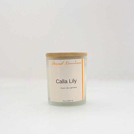 A 8 oz frosted Calla Lily candle with a wooden lid sitting against a white background made by Eternel Luminen.