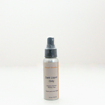 A 2.5 oz Dark Liquor Only room & linen spray sitting against a white background made by Eternel Luminen. 