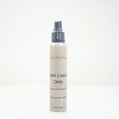 A 4oz Dark Liquor Only room & linen spray sitting against a white background made by Eternel Luminen.