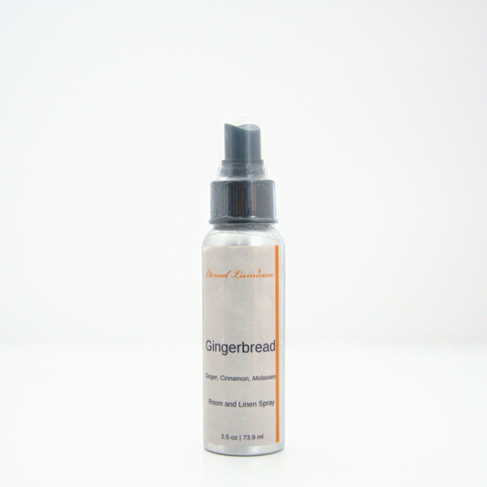 A 2.5oz Gingerbread room & linen spray sitting against a white background made by Eternel Luminen.