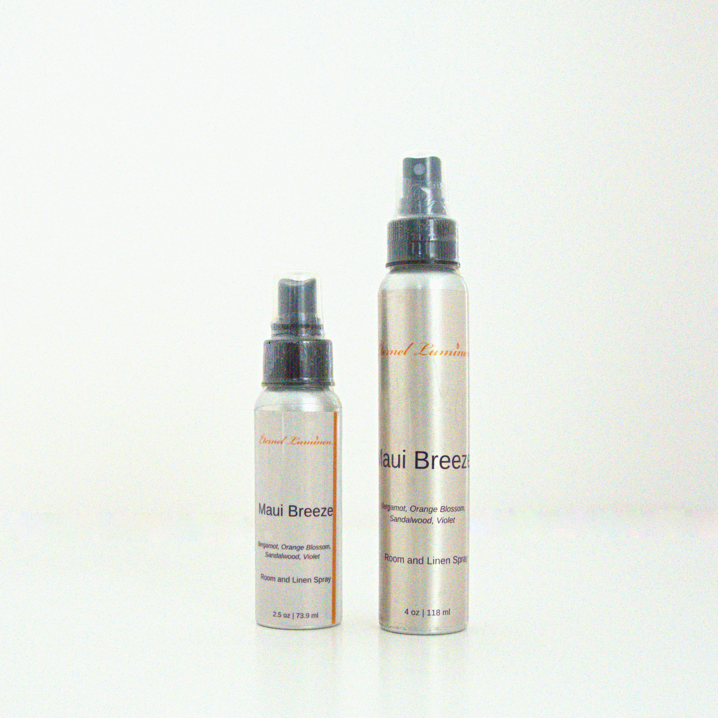A 2.5oz & 4oz Maui Breeze room & linen spray sitting against a white background made by Eternel Luminen. 