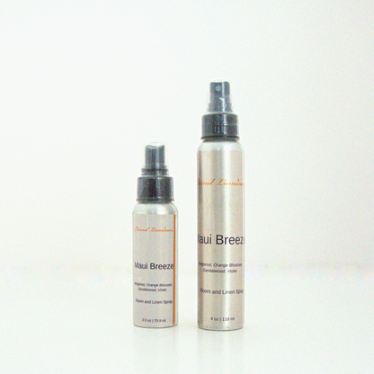 A 2.5oz & 4oz Maui Breeze room & linen spray sitting against a white background made by Eternel Luminen. 