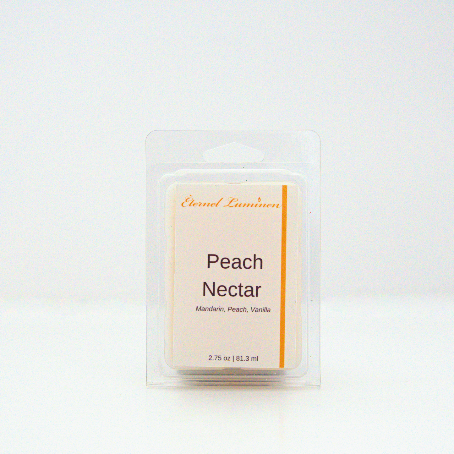 A 2.75 oz, 6 cube, peach nectar wax melt sitting against a white background made by Eternel Luminen.