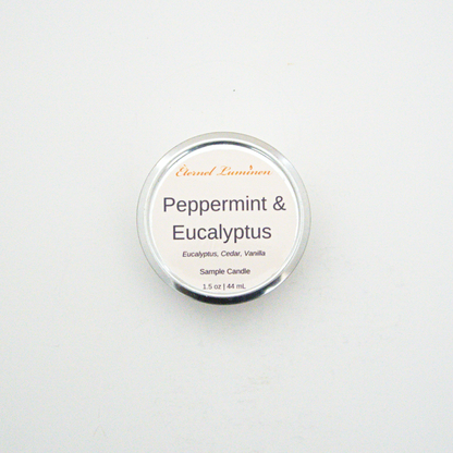 A 1.5oz Peppermint & Eucalyptus sample candle in a tin jar sitting against a white background made by Eternel Luminen