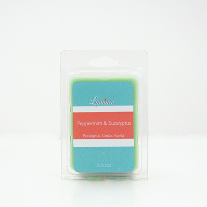 A 2.75 oz, 6 cube, peppermint & eucalyptus wax melt sitting against a white background made by Eternel Luminen.