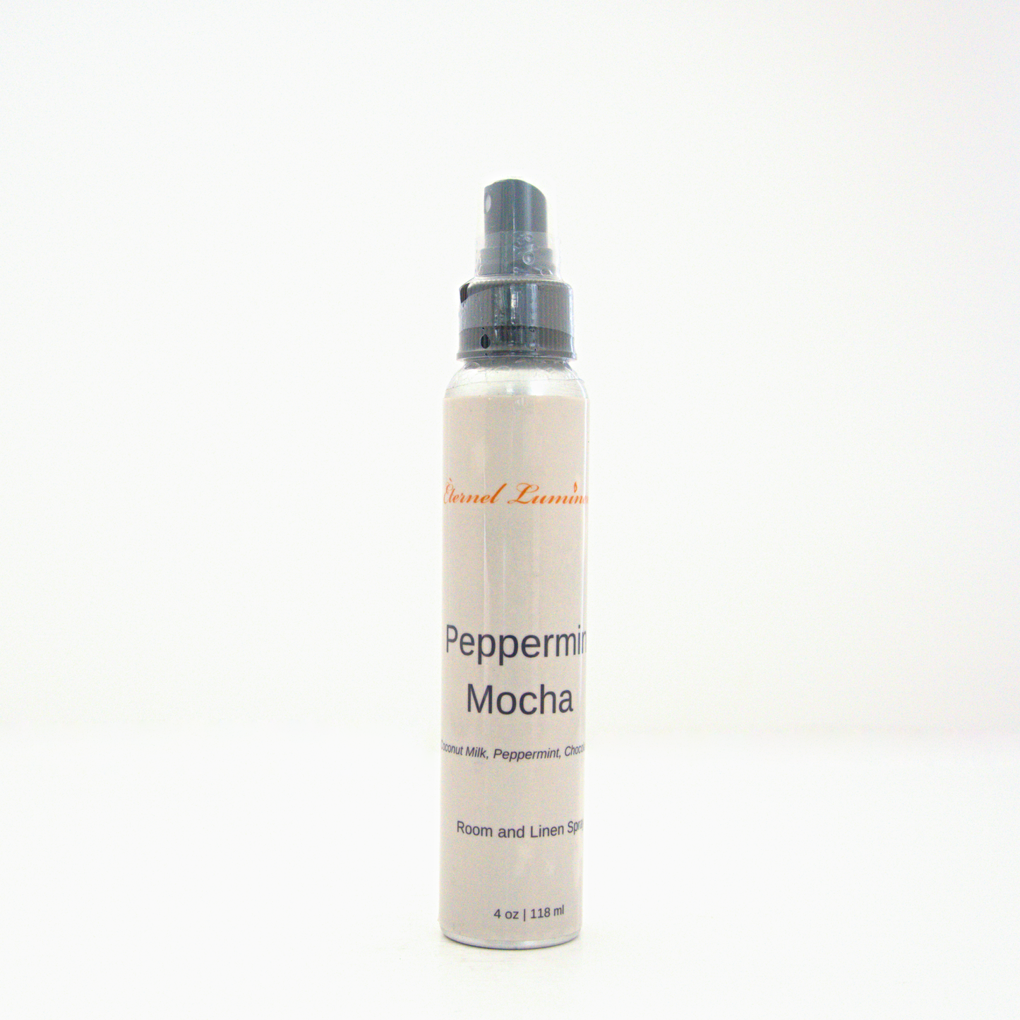 A 4oz Peppermint Mocha room & linen spray sitting against a white background made by Eternel Luminen.