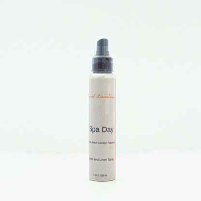 A 4 oz Spa Day room & linen spray sitting against a white background made by Eternel Luminen.