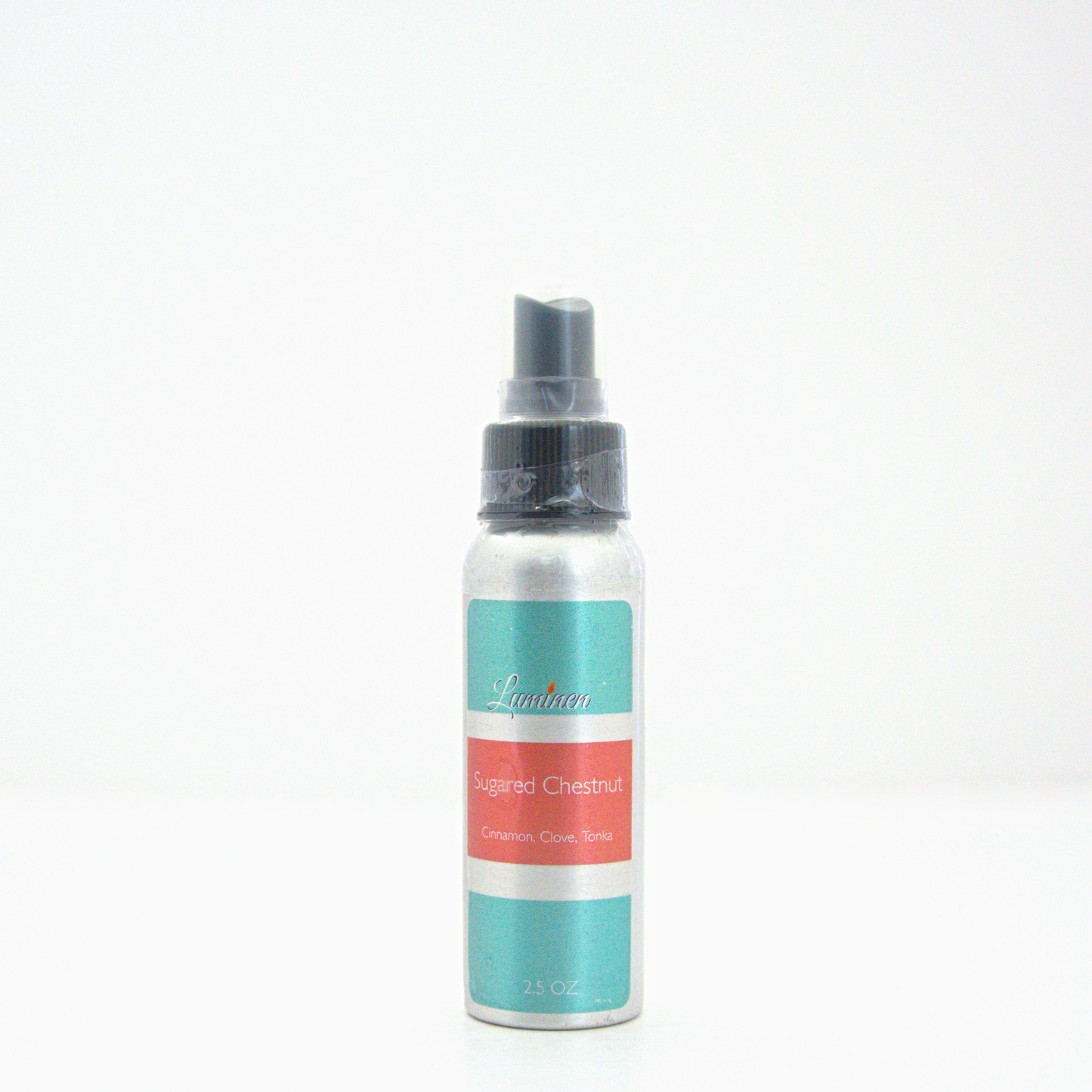 A 2.5oz Sugared Chestnut room & linen spray sitting against a white background made by Eternel Luminen.