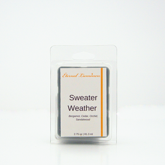 A 2.75 oz, 6 cube, sweater weather  wax melt sitting against a white background made by Eternel Luminen.