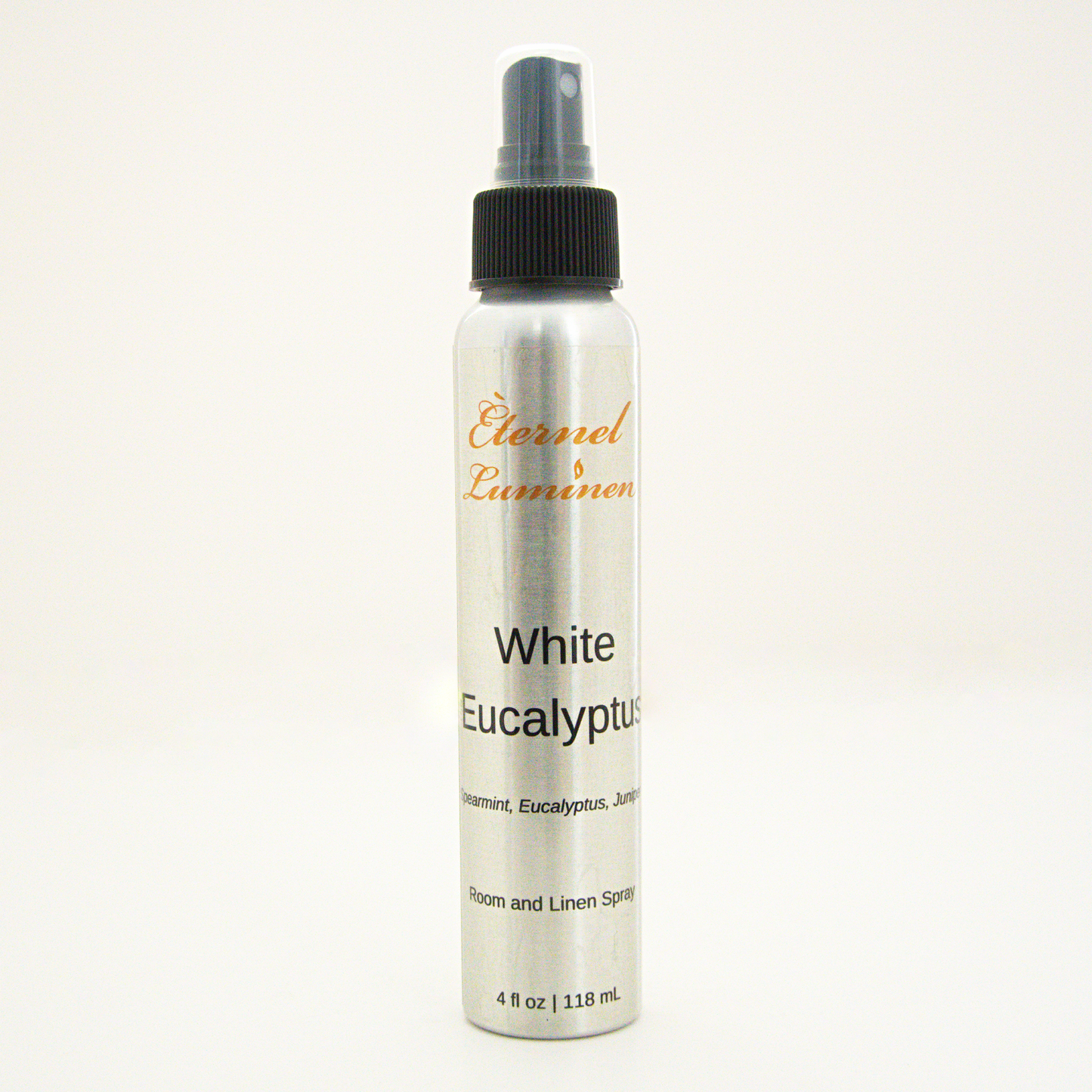 A 4oz White Sage & Lavender room & linen spray sitting against a white background made by Eternel Luminen. 