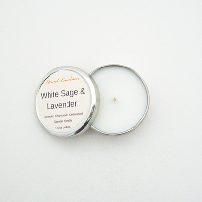 A 1.5oz White Sage & Lavender sample candle in a tin jar with the lid off sitting against a white background made by Eternel Luminen.