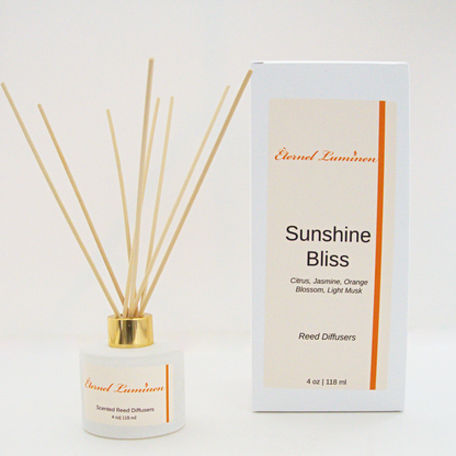 A 4oz Sunshine Bliss reed diffuser in a frosted white jar sitting against a white background made by Eternel Luminen 